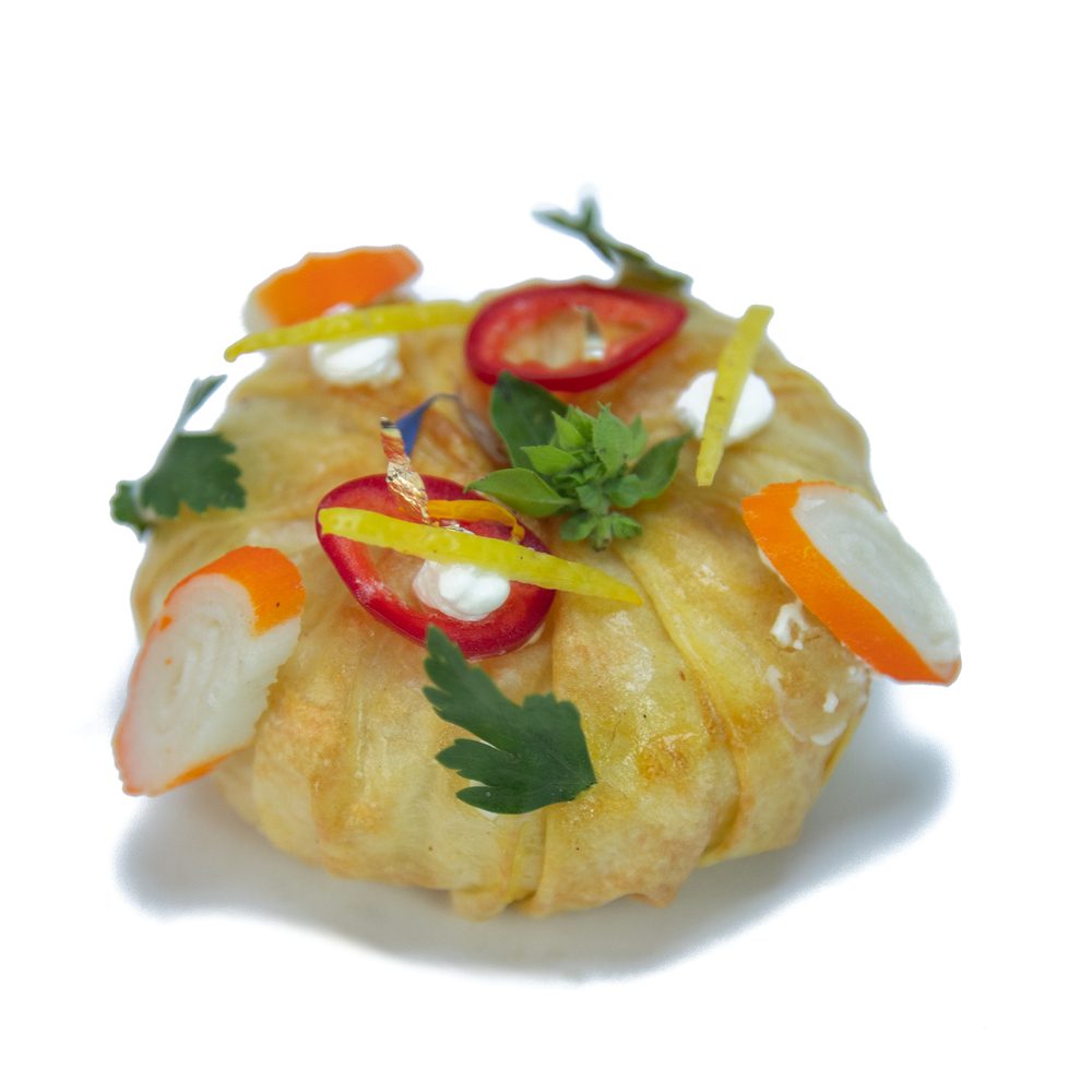Pastilla Fruit Mer - Mélange de fruits de mer, vermicelle de riz et citron confit, un véritable régal.